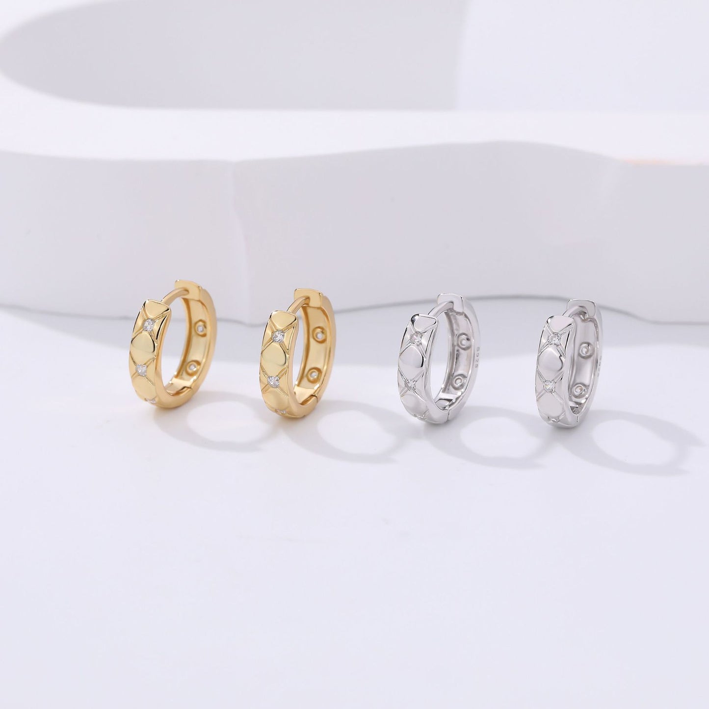 EARRINGS CZ CRISS CROSS 18K PLATED HUGGIES
