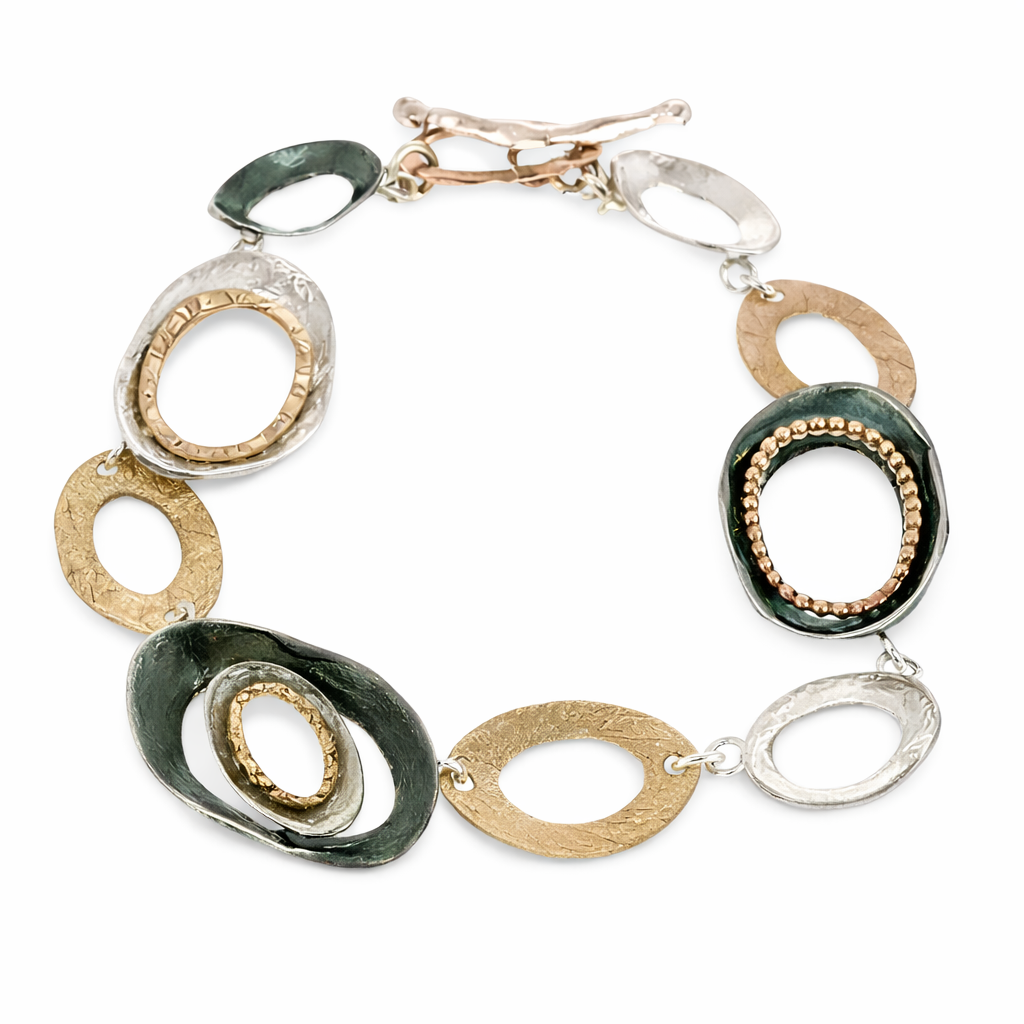 BRACELET GOLD FILLED AND SILVER OVAL DETAIL