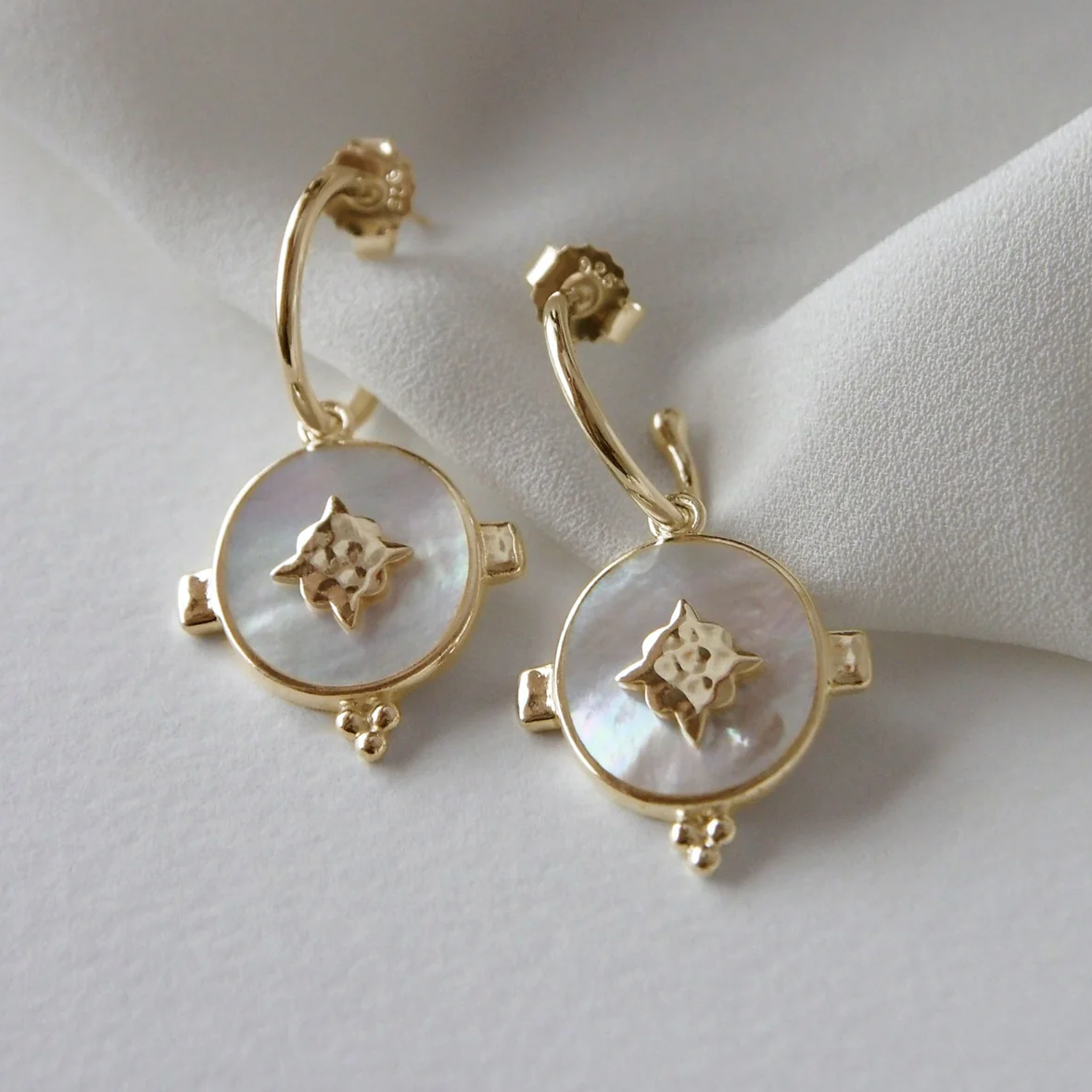 TEMPLE MOON OVAL HOOP EARRINGS