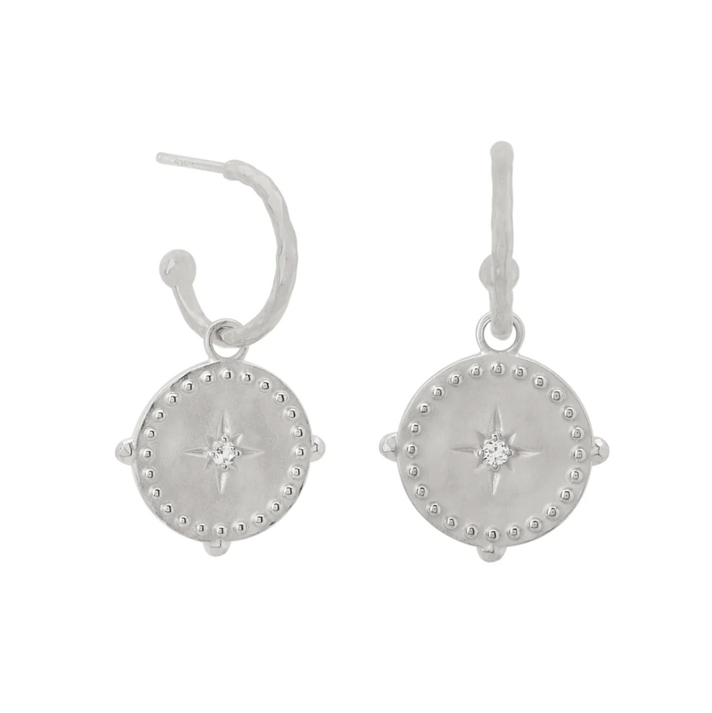 SMALL HOOP EARRINGS INTO THE LIGHT