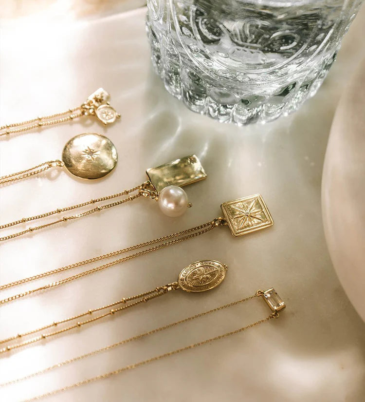 TRUE NORTH COIN PENDANT - 18K GOLD VERMEIL