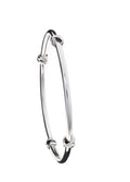 SILVER BANGLE WITH KNOTS